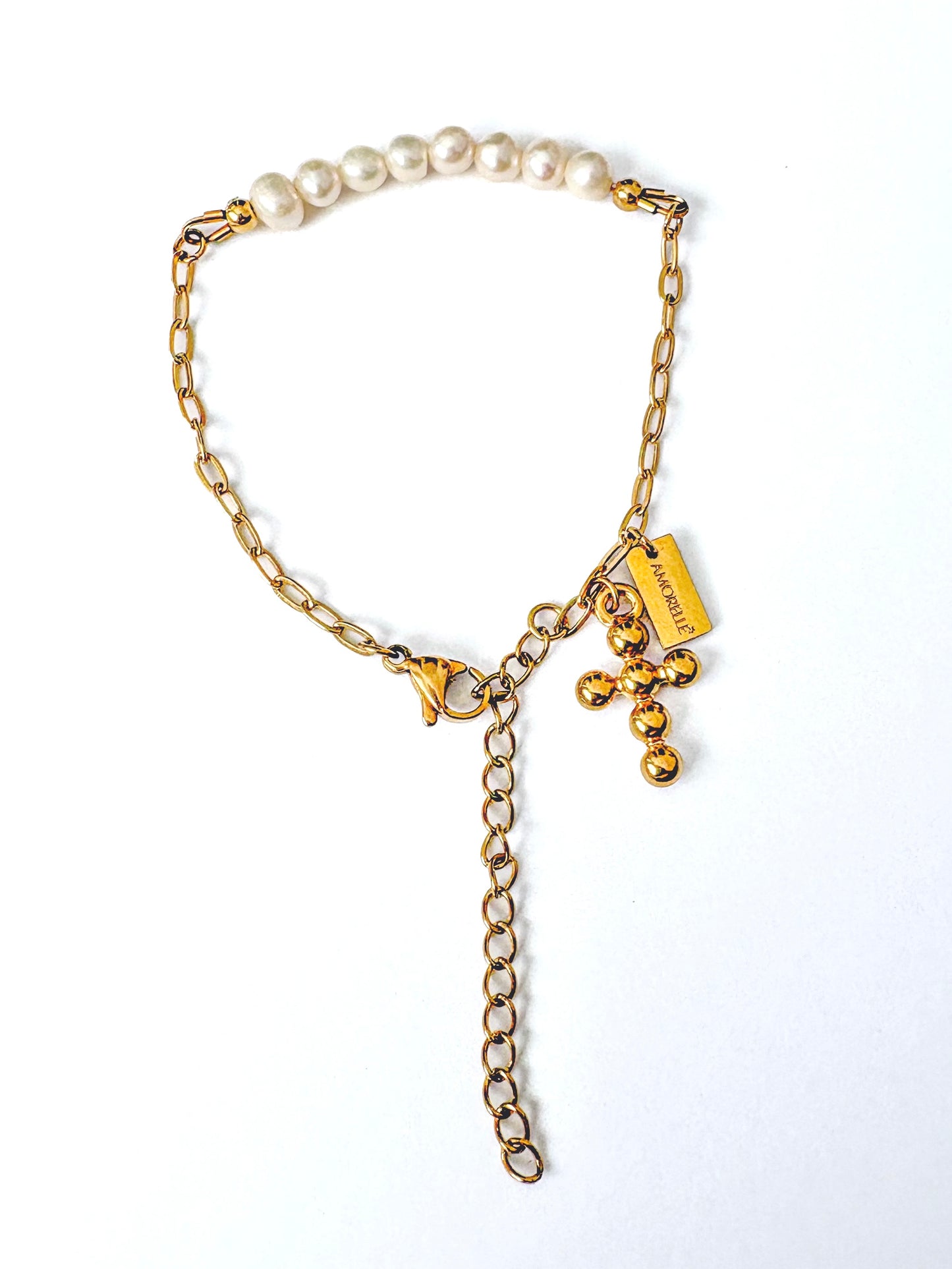 Pulsera de perlas y cruz "Fe que Abraza"