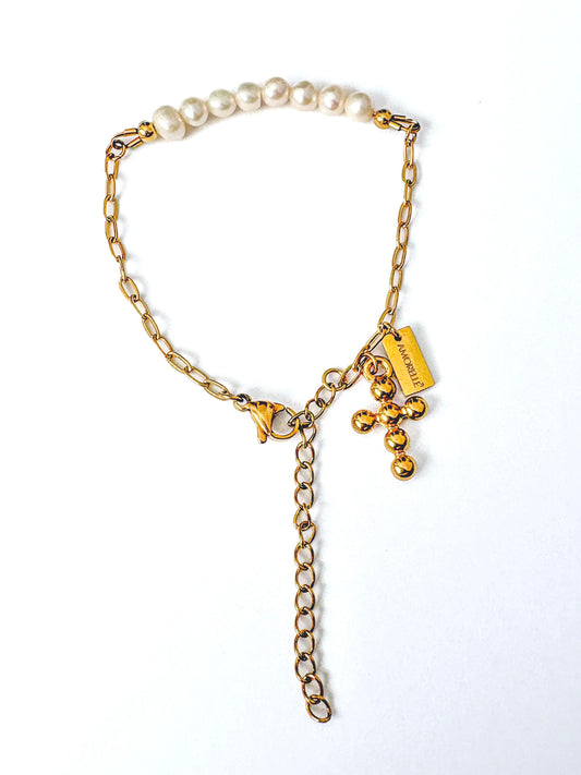 Pulsera de perlas y cruz "Fe que Abraza"